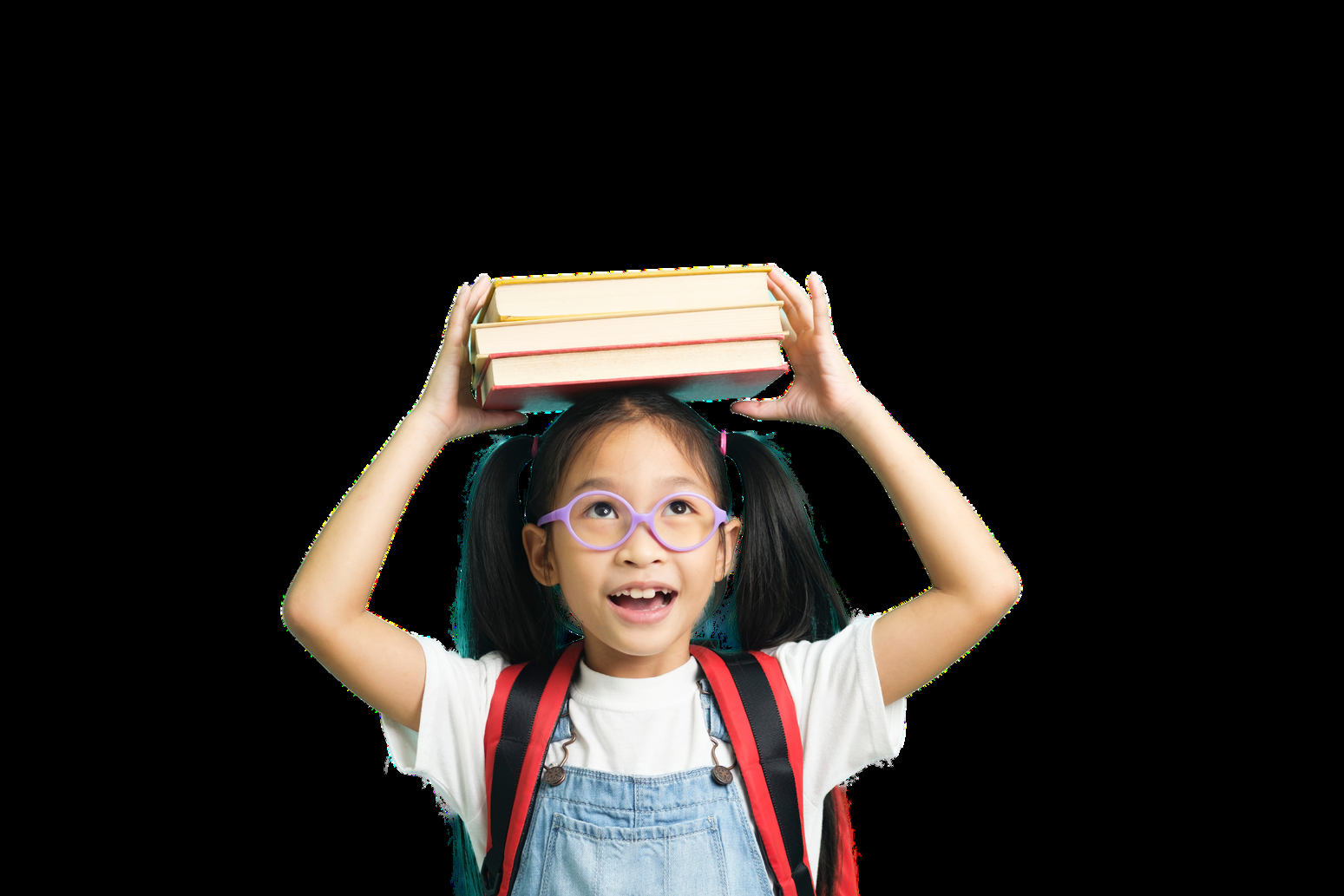 A young student joyfully balancing a stack of books — representing learning with SIO